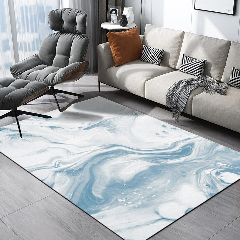 Moderner Teppich für das Wohnzimmer in Blau und Weiß mit abstraktem Ozeanmuster, Polyester, waschbar, haustierfreundlich.