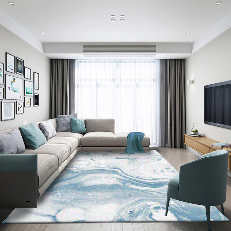 Moderner Teppich für das Wohnzimmer in Blau und Weiß mit abstraktem Ozeanmuster, Polyester, waschbar, haustierfreundlich.