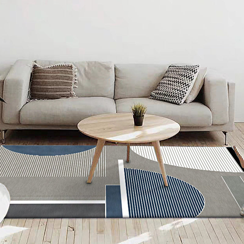 Moderner Wohnzimmerteppich in grauem Farbblockstreifen unregelmäßige Form bedruckter Teppich Polyester rutschfeste Rückseite Teppich