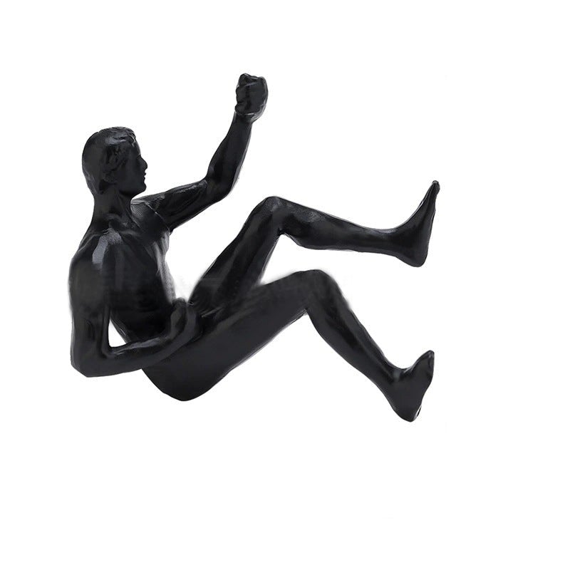 Kletterwand hängende Statuen