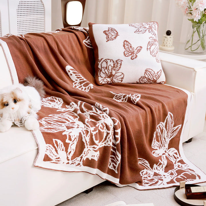 Dekorativer Wurfdecke mit floralen Design