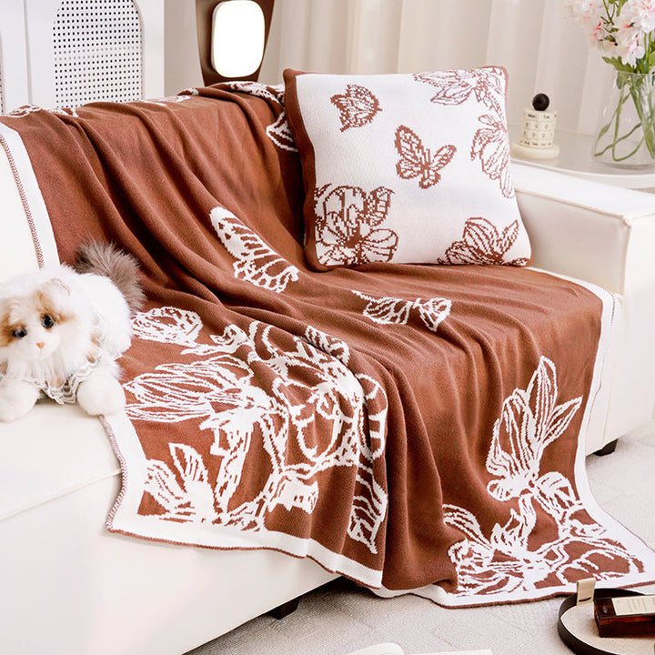 Dekorativer Wurfdecke mit floralen Design
