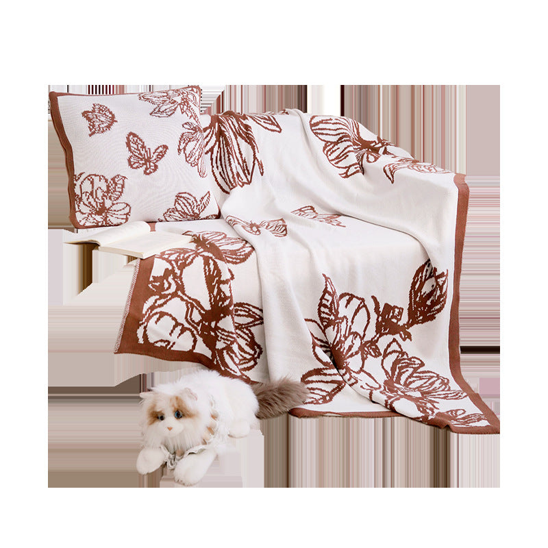 Dekorativer Wurfdecke mit floralen Design