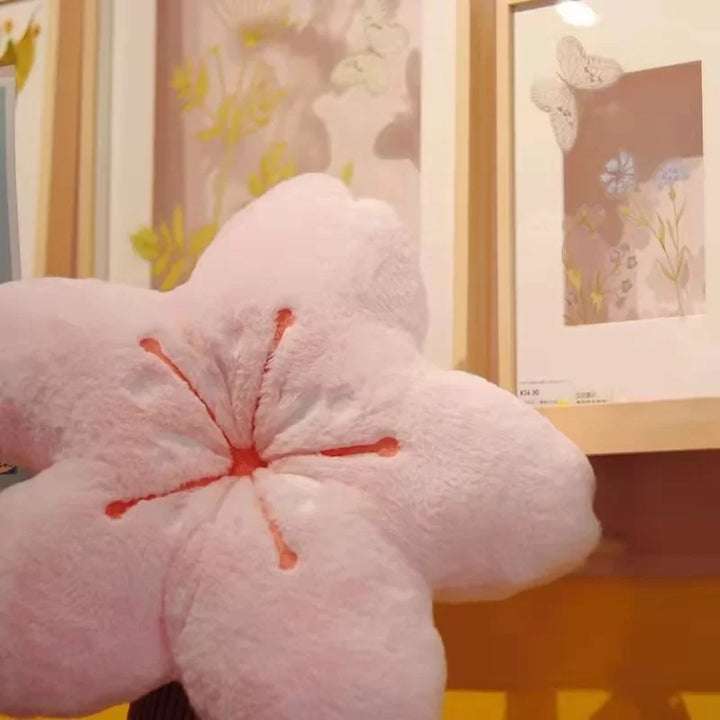 Blumenkissenparadies mit pinkem Akzent