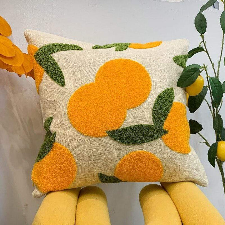 Orange gesticktes Dekokissen